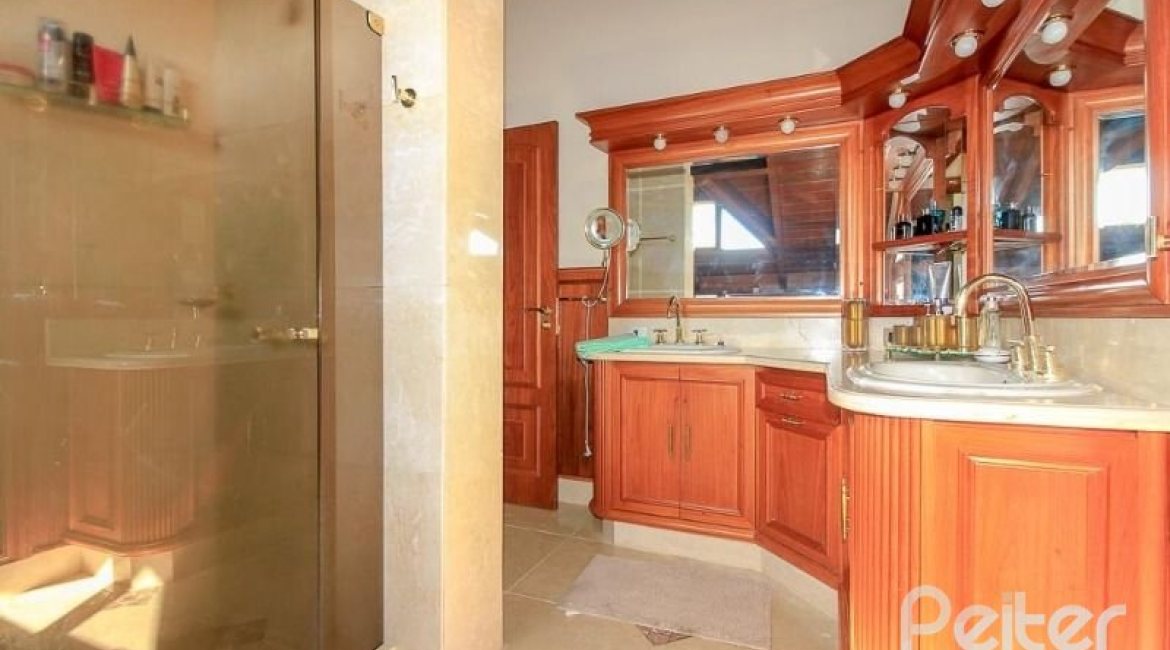 Casa em Condomínio à venda com 609m², 6 dormitórios, 2 suítes, 3 vagas, no bairro Cavalhada em PORTO ALEGRE