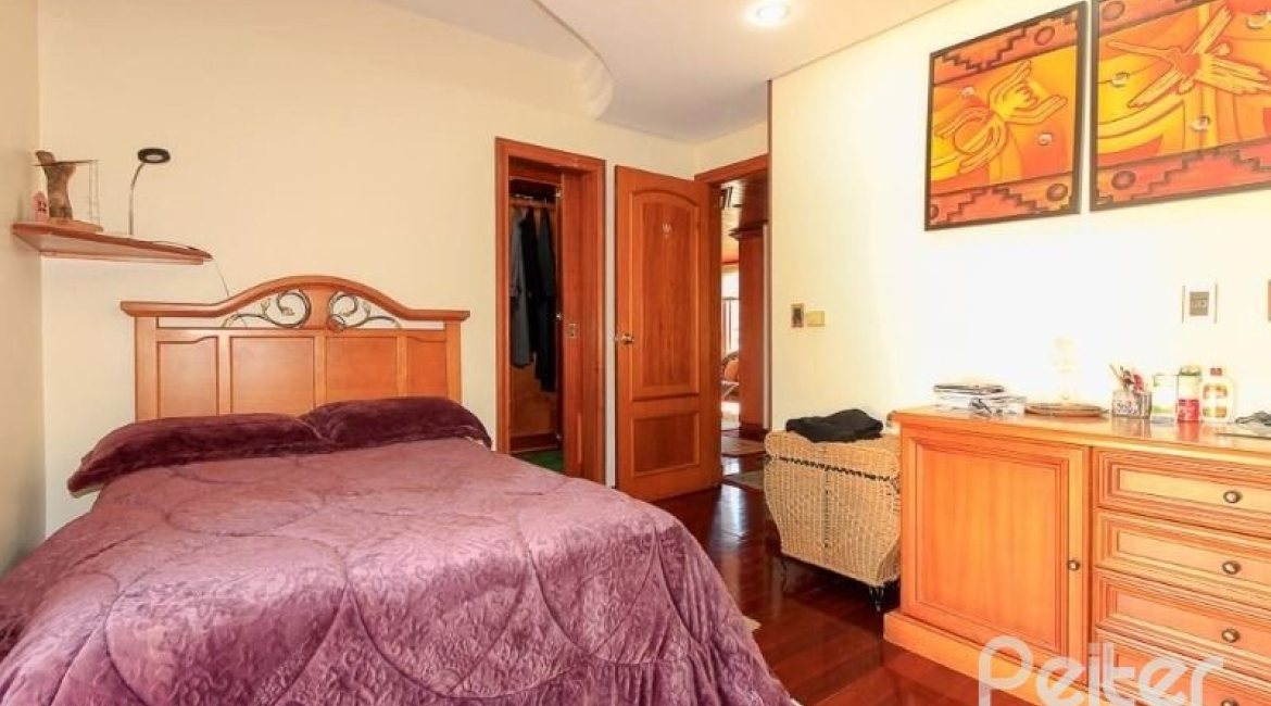 Casa em Condomínio à venda com 609m², 6 dormitórios, 2 suítes, 3 vagas, no bairro Cavalhada em PORTO ALEGRE