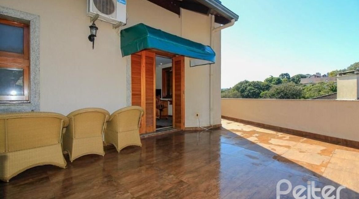 Casa em Condomínio à venda com 609m², 6 dormitórios, 2 suítes, 3 vagas, no bairro Cavalhada em PORTO ALEGRE