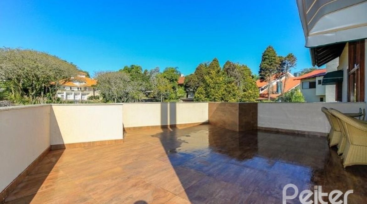 Casa em Condomínio à venda com 609m², 6 dormitórios, 2 suítes, 3 vagas, no bairro Cavalhada em PORTO ALEGRE