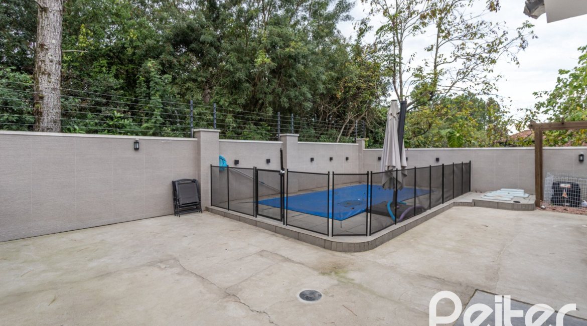 Casa em Condomínio à venda com 242m², 3 dormitórios, 3 suítes, 4 vagas, no bairro Mountain Ville em PORTO ALEGRE