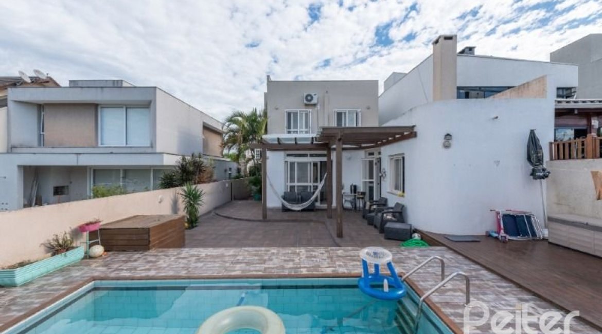 Casa em Condomínio à venda com 178m², 4 dormitórios, 2 suítes, 2 vagas, no bairro Mountain Ville em PORTO ALEGRE