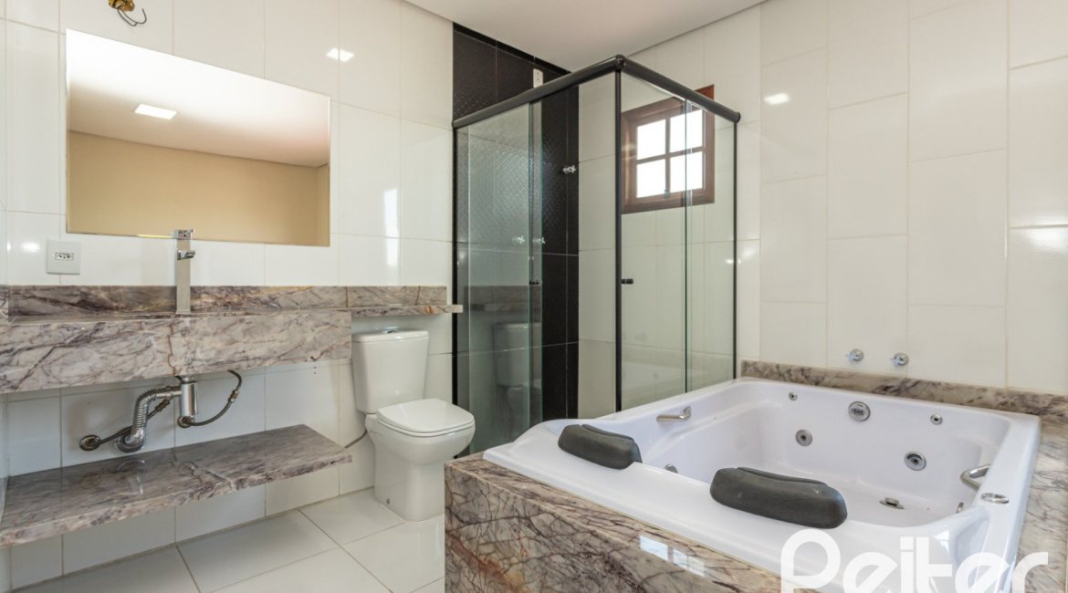 Casa à venda com 186m², 3 dormitórios, 3 suítes, 2 vagas, no bairro Espírito Santo em Porto Alegre