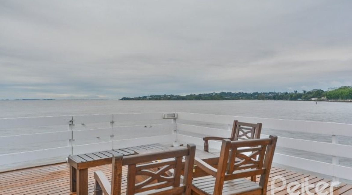 Casa em Condomínio à venda com 338m², 3 dormitórios, 1 suíte, 2 vagas, no bairro Tristeza em PORTO ALEGRE