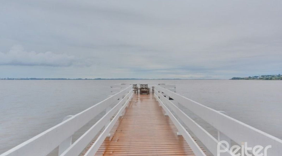 Casa em Condomínio à venda com 338m², 3 dormitórios, 1 suíte, 2 vagas, no bairro Tristeza em PORTO ALEGRE