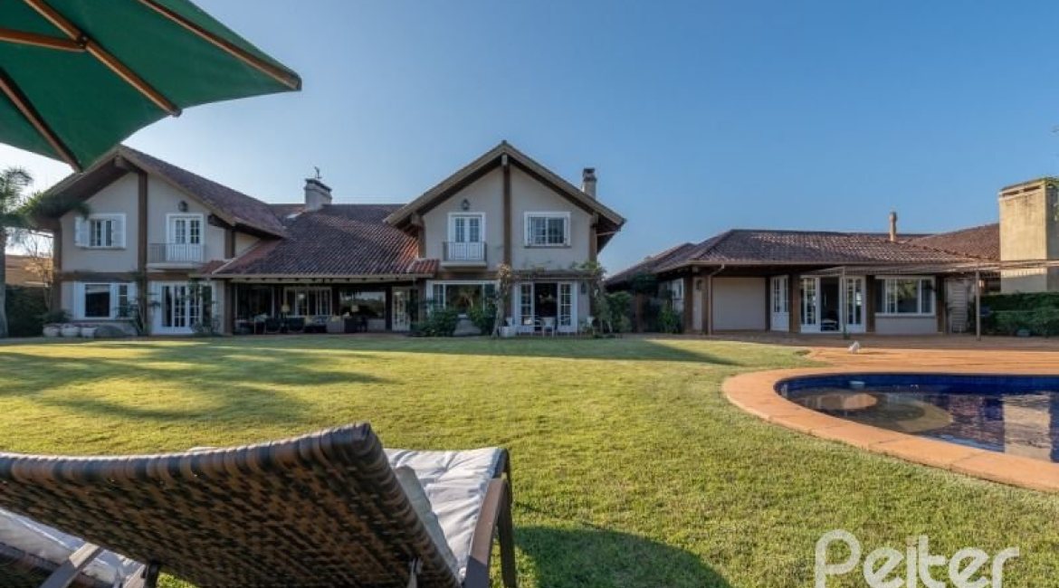 Casa em Condomínio à venda com 817m², 5 dormitórios, 5 suítes, 8 vagas, no bairro Terra Ville em PORTO ALEGRE
