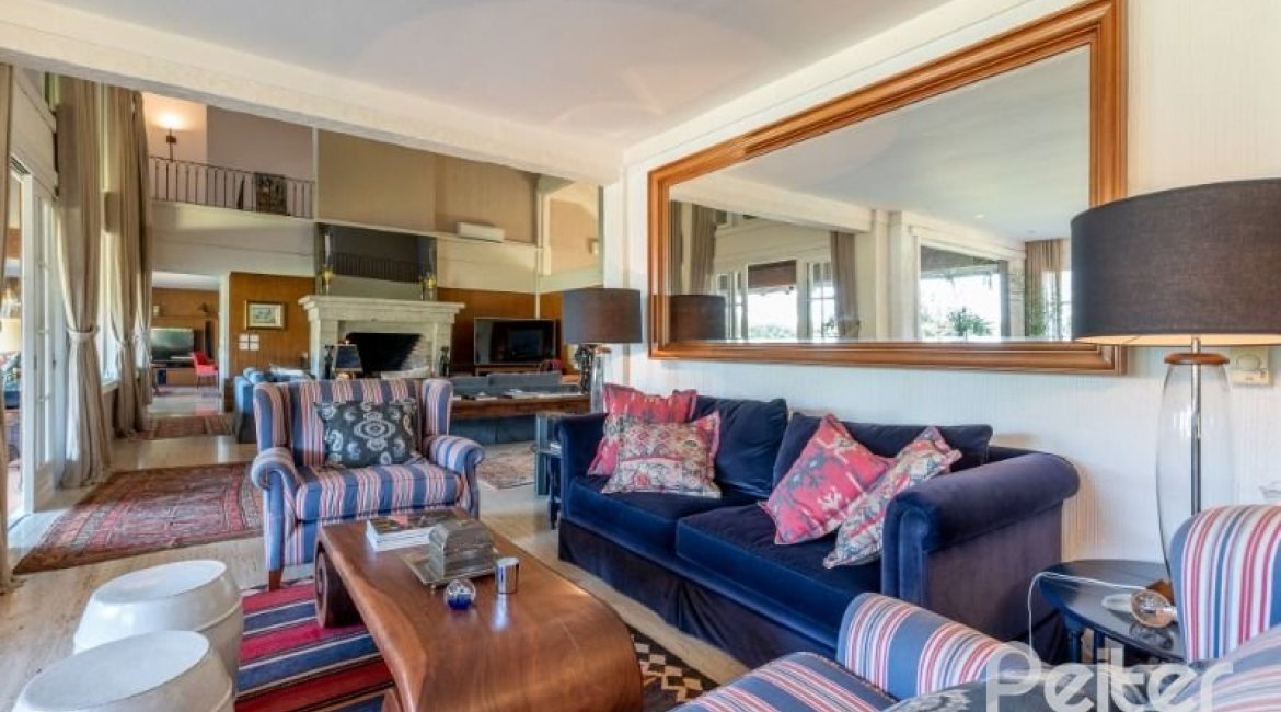 Casa em Condomínio à venda com 817m², 5 dormitórios, 5 suítes, 8 vagas, no bairro Terra Ville em PORTO ALEGRE