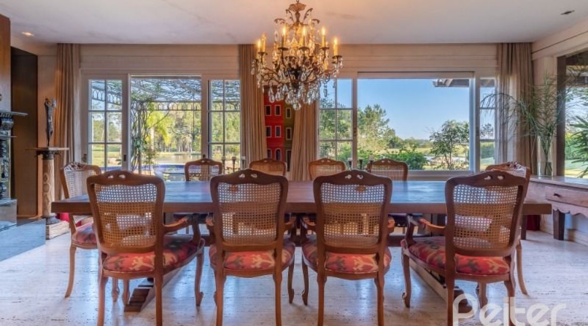 Casa em Condomínio à venda com 817m², 5 dormitórios, 5 suítes, 8 vagas, no bairro Terra Ville em PORTO ALEGRE