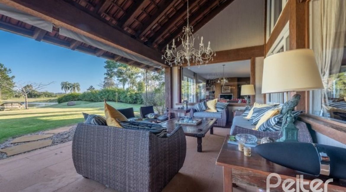 Casa em Condomínio à venda com 817m², 5 dormitórios, 5 suítes, 8 vagas, no bairro Terra Ville em PORTO ALEGRE