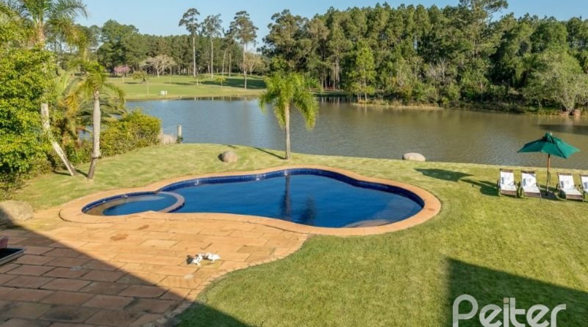 Casa em Condomínio à venda com 817m², 5 dormitórios, 5 suítes, 8 vagas, no bairro Terra Ville em PORTO ALEGRE