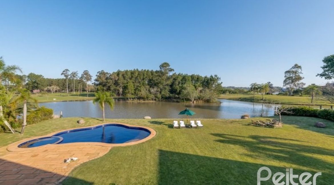 Casa em Condomínio à venda com 817m², 5 dormitórios, 5 suítes, 8 vagas, no bairro Terra Ville em PORTO ALEGRE