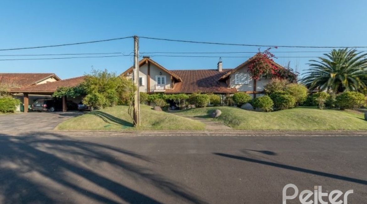 Casa em Condomínio à venda com 817m², 5 dormitórios, 5 suítes, 8 vagas, no bairro Terra Ville em PORTO ALEGRE
