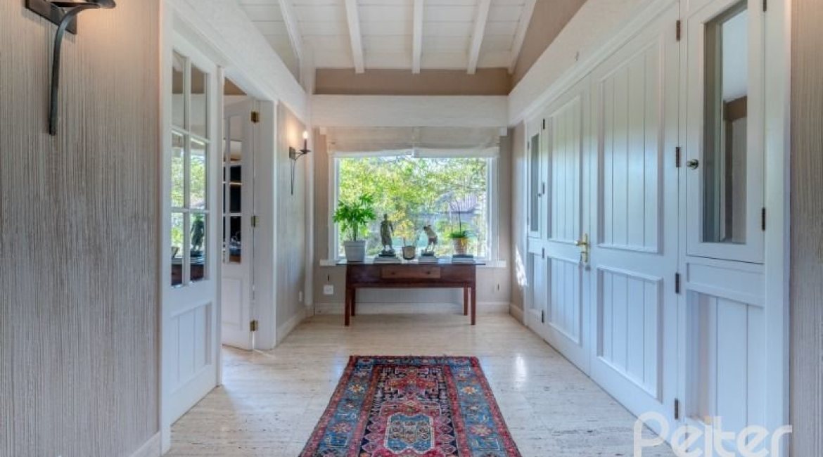 Casa em Condomínio à venda com 817m², 5 dormitórios, 5 suítes, 8 vagas, no bairro Terra Ville em PORTO ALEGRE