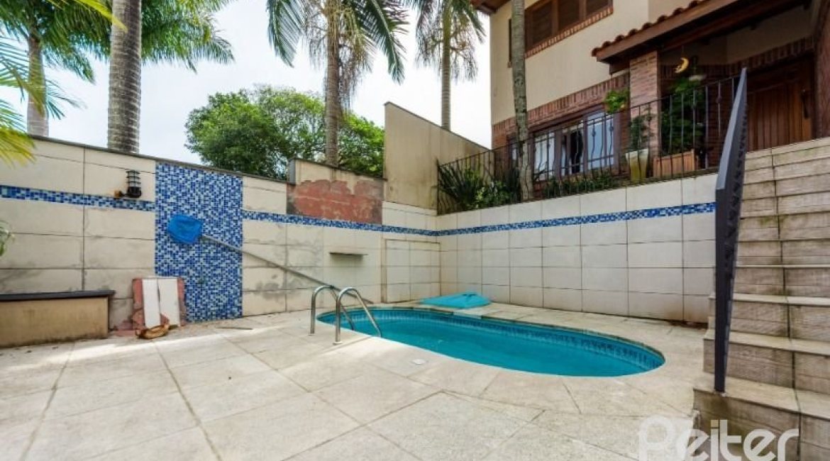 Casa em Condomínio à venda com 166m², 3 dormitórios, 1 suíte, 1 vaga, no bairro Jardim Isabel em Porto Alegre