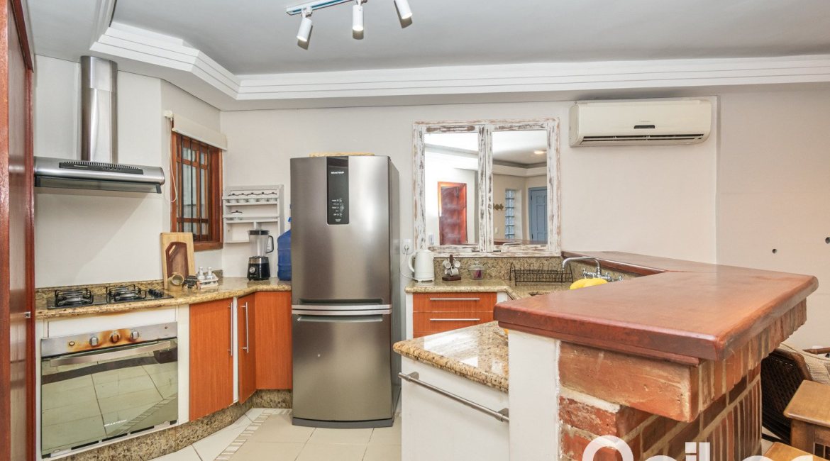 Casa em Condomínio à venda com 166m², 3 dormitórios, 1 suíte, 1 vaga, no bairro Jardim Isabel em Porto Alegre