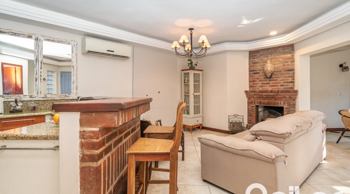 Casa em Condomínio à venda com 166m², 3 dormitórios, 1 suíte, 1 vaga, no bairro Jardim Isabel em Porto Alegre