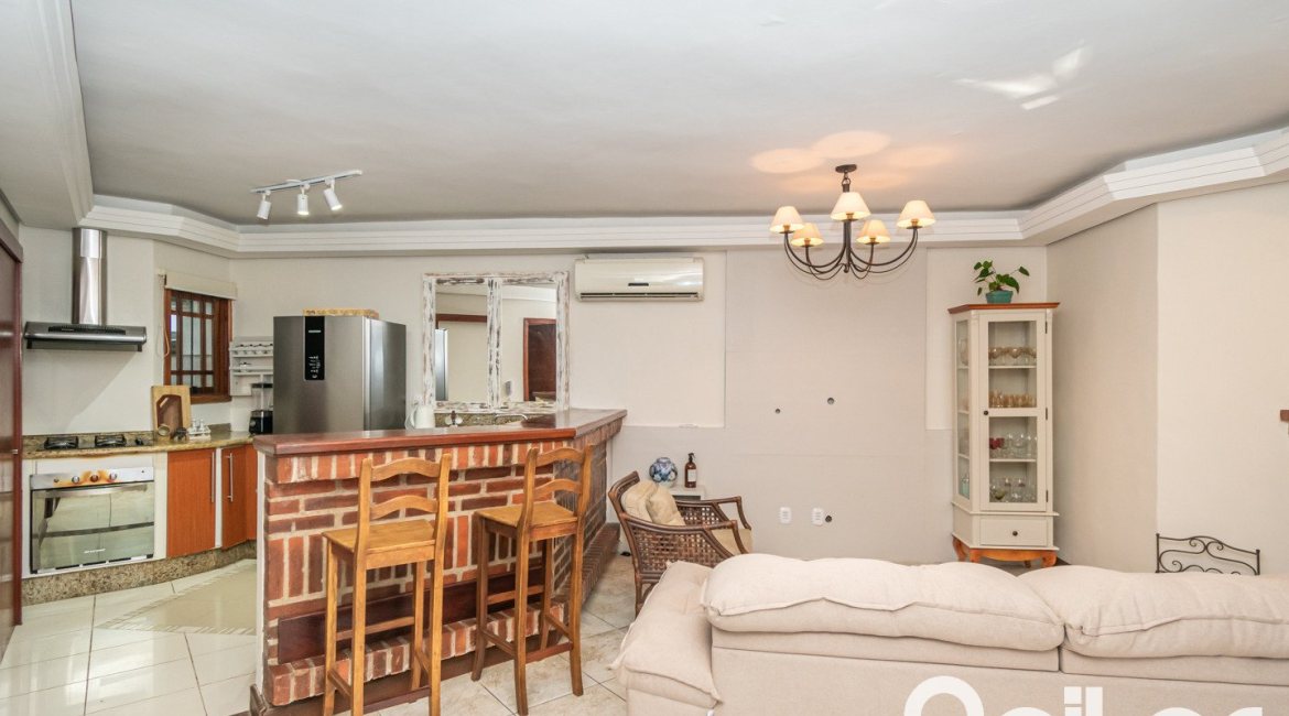 Casa em Condomínio à venda com 166m², 3 dormitórios, 1 suíte, 1 vaga, no bairro Jardim Isabel em Porto Alegre