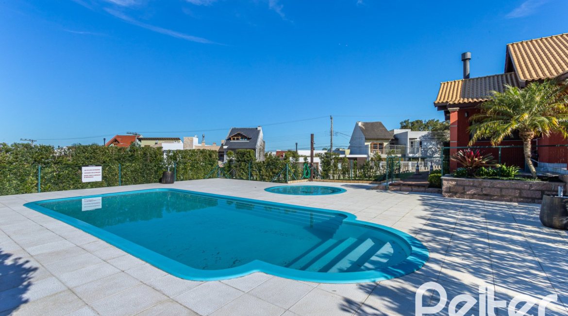 Casa em Condomínio à venda com 266m², 3 dormitórios, 3 suítes, 2 vagas, no bairro Hipica em PORTO ALEGRE