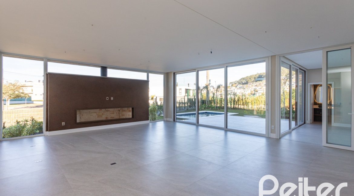 Casa em Condomínio à venda com 400m², 3 dormitórios, 3 suítes, 4 vagas, no bairro Alphaville em PORTO ALEGRE