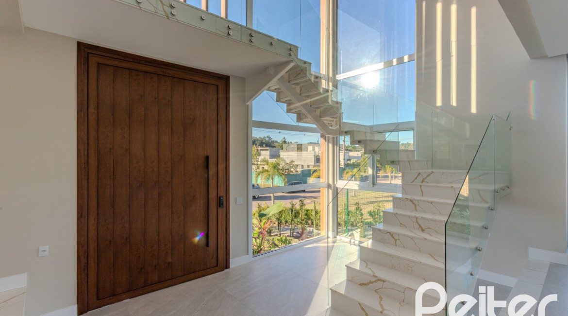 Casa em Condomínio à venda com 400m², 3 dormitórios, 3 suítes, 4 vagas, no bairro Alphaville em PORTO ALEGRE