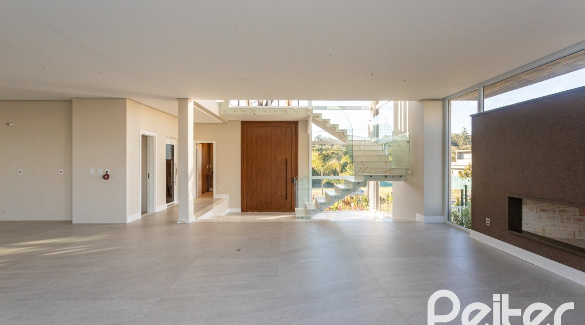 Casa em Condomínio à venda com 400m², 3 dormitórios, 3 suítes, 4 vagas, no bairro Alphaville em PORTO ALEGRE