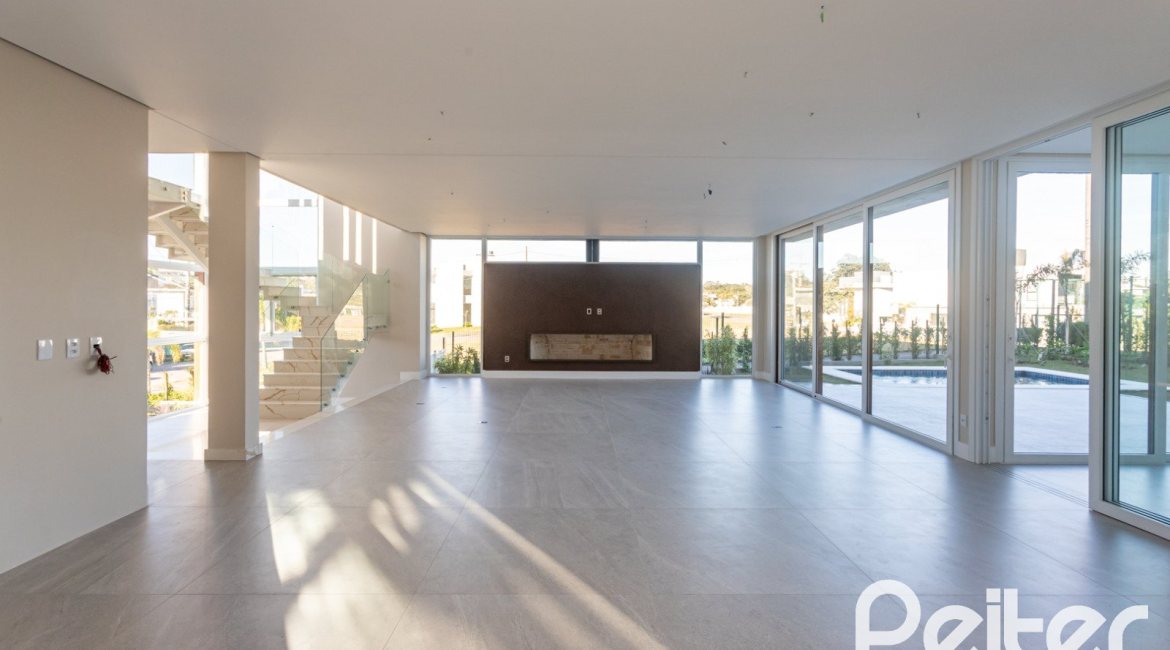Casa em Condomínio à venda com 400m², 3 dormitórios, 3 suítes, 4 vagas, no bairro Alphaville em PORTO ALEGRE