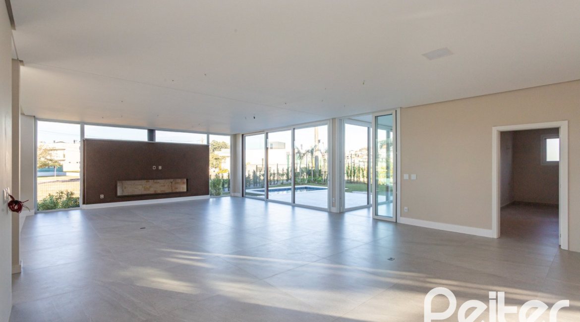 Casa em Condomínio à venda com 400m², 3 dormitórios, 3 suítes, 4 vagas, no bairro Alphaville em PORTO ALEGRE