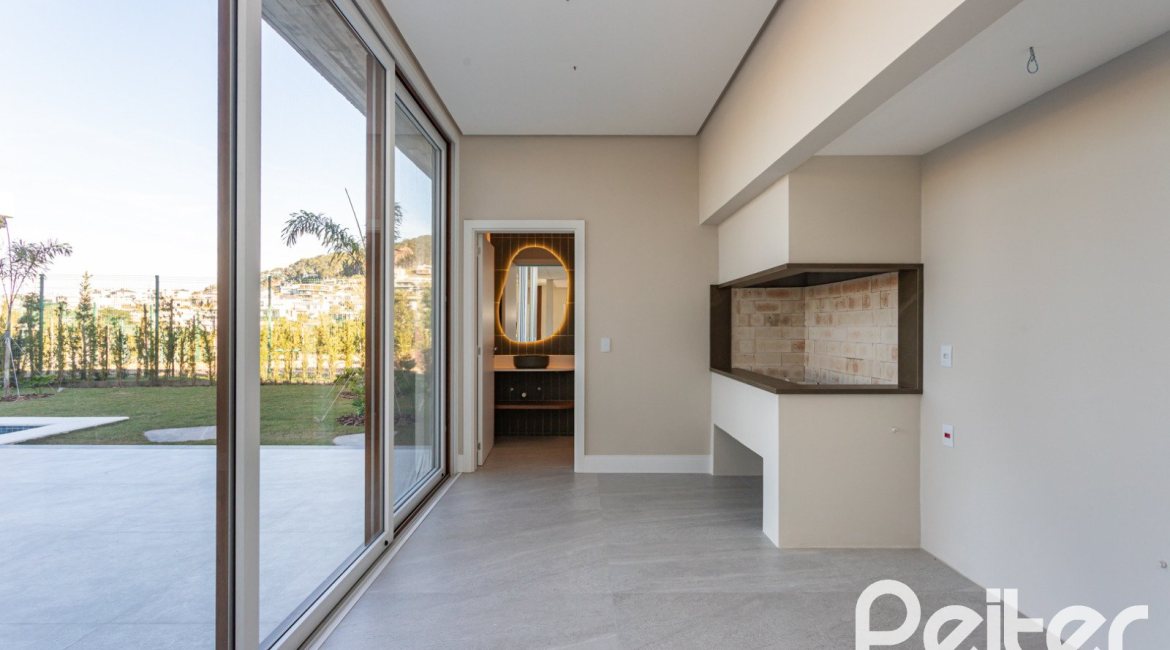 Casa em Condomínio à venda com 400m², 3 dormitórios, 3 suítes, 4 vagas, no bairro Alphaville em PORTO ALEGRE