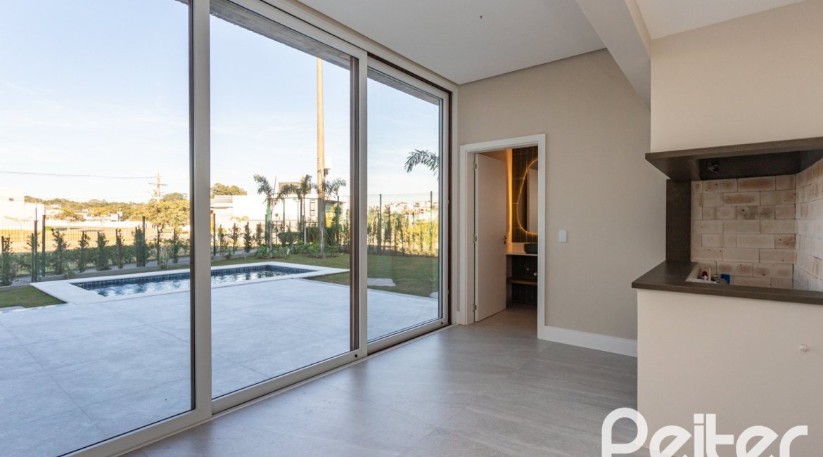 Casa em Condomínio à venda com 400m², 3 dormitórios, 3 suítes, 4 vagas, no bairro Alphaville em PORTO ALEGRE