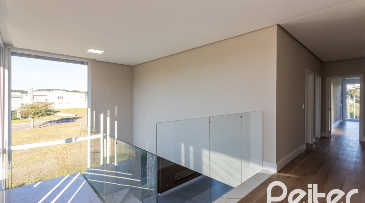 Casa em Condomínio à venda com 400m², 3 dormitórios, 3 suítes, 4 vagas, no bairro Alphaville em PORTO ALEGRE