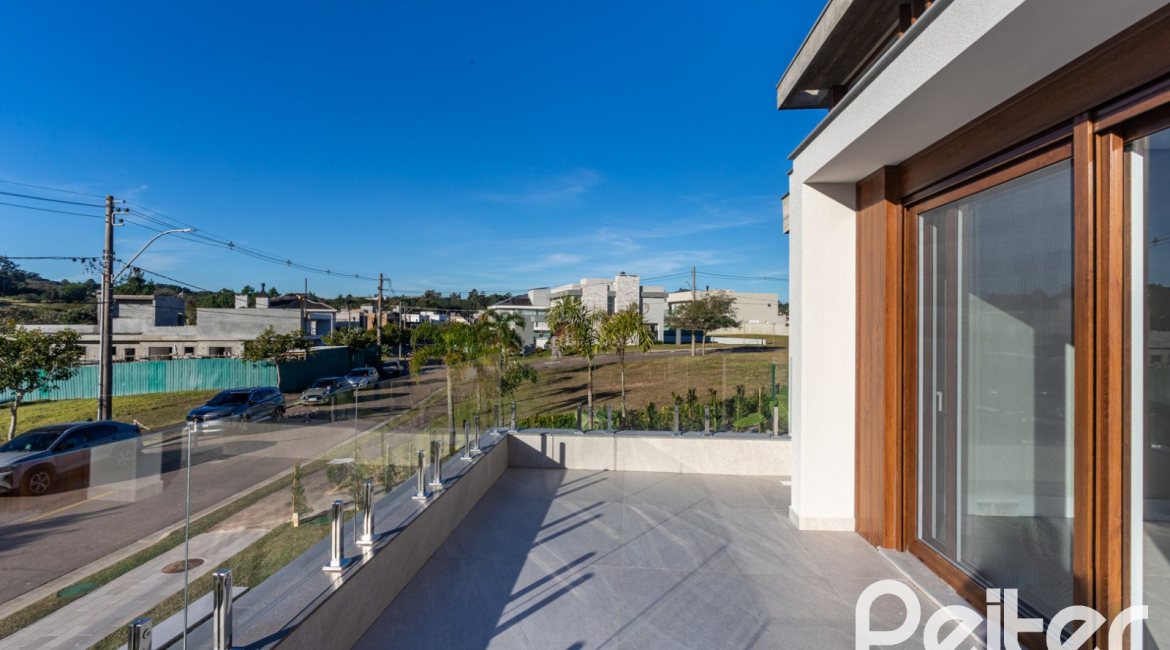 Casa em Condomínio à venda com 400m², 3 dormitórios, 3 suítes, 4 vagas, no bairro Alphaville em PORTO ALEGRE