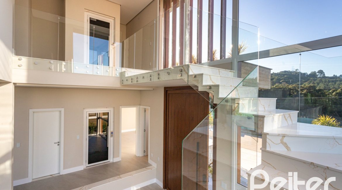 Casa em Condomínio à venda com 400m², 3 dormitórios, 3 suítes, 4 vagas, no bairro Alphaville em PORTO ALEGRE
