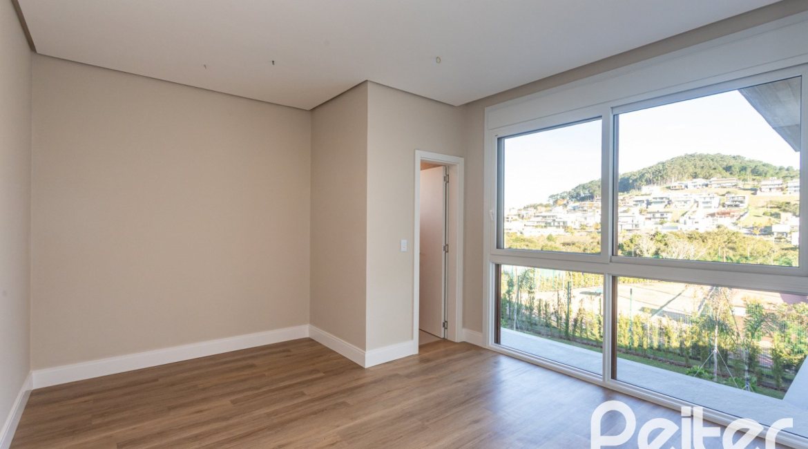 Casa em Condomínio à venda com 400m², 3 dormitórios, 3 suítes, 4 vagas, no bairro Alphaville em PORTO ALEGRE