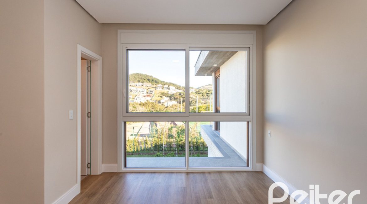 Casa em Condomínio à venda com 400m², 3 dormitórios, 3 suítes, 4 vagas, no bairro Alphaville em PORTO ALEGRE
