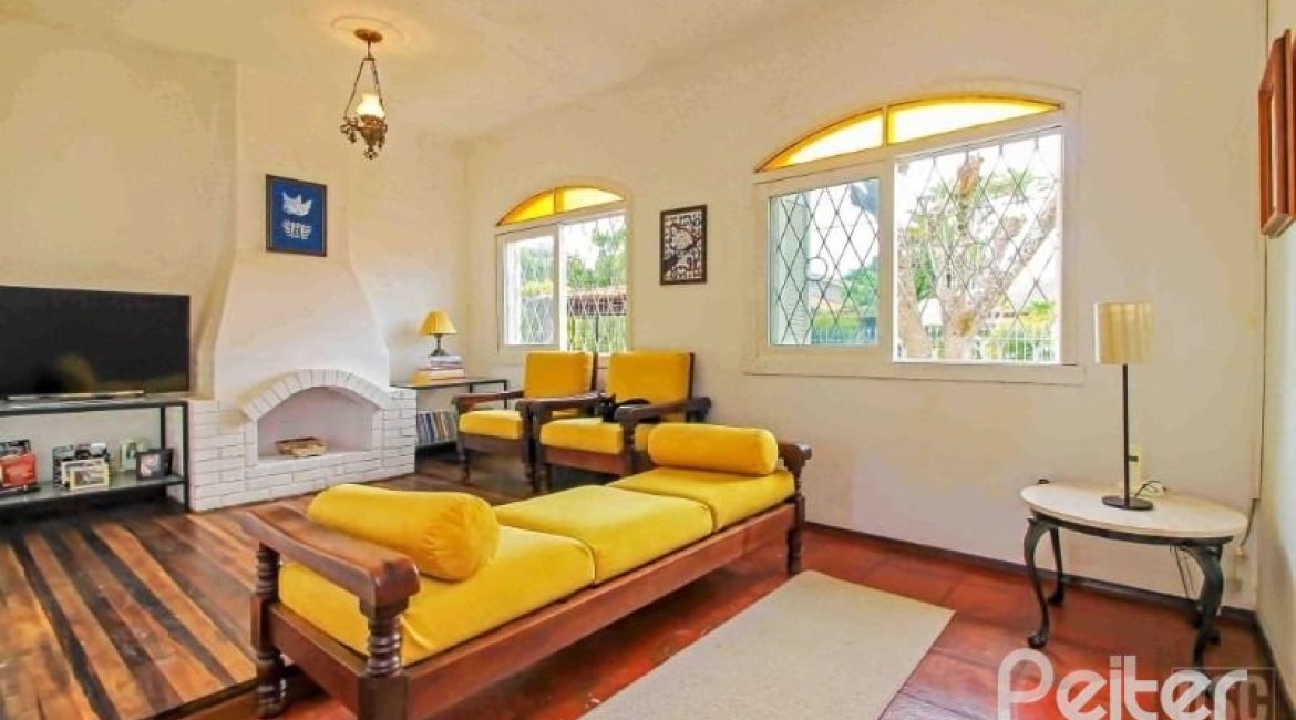 Casa à venda com 312m², 3 dormitórios, 2 suítes, 2 vagas, no bairro Ipanema em Porto Alegre