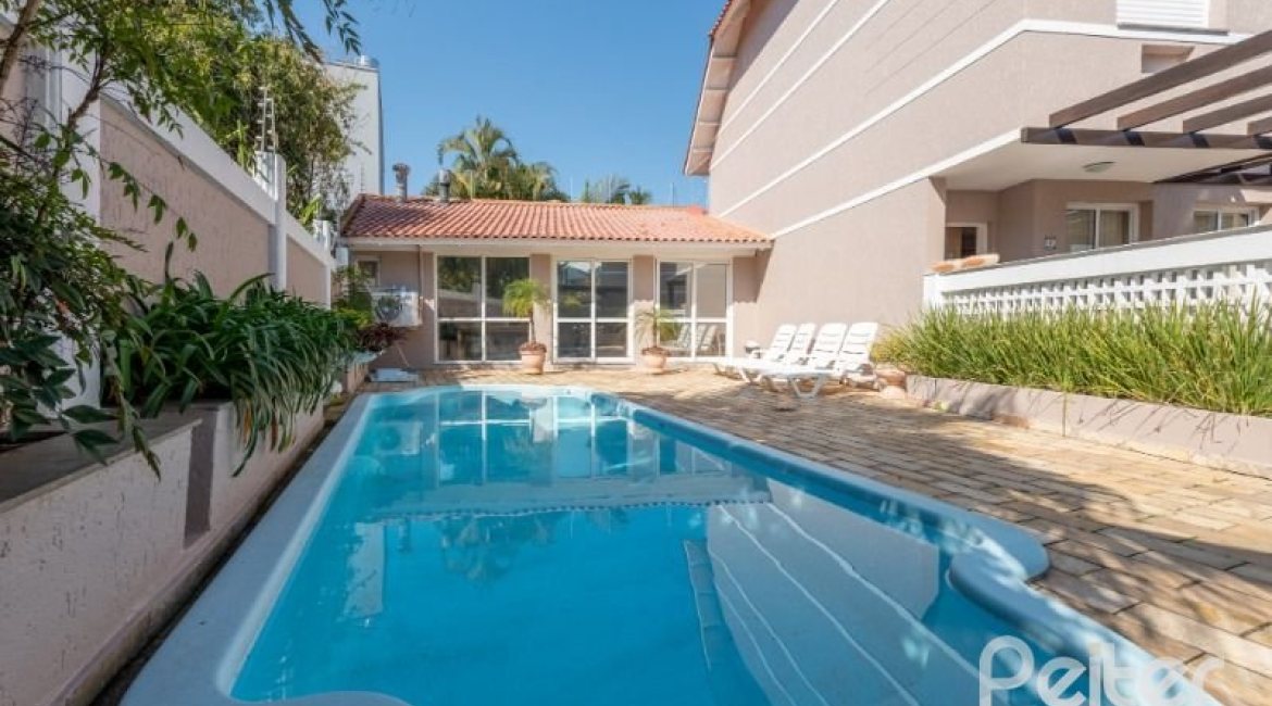 Casa em Condomínio à venda com 162m², 3 dormitórios, 1 suíte, 2 vagas, no bairro Vila Assunção em PORTO ALEGRE