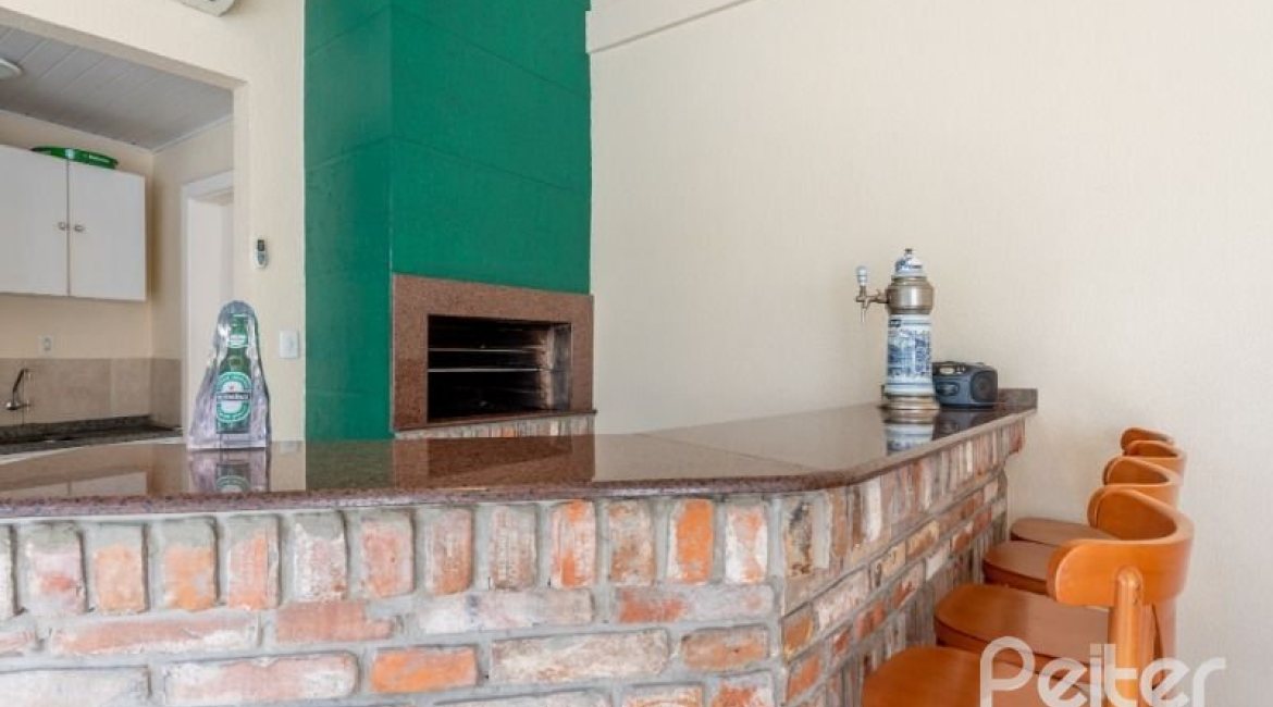 Casa em Condomínio à venda com 162m², 3 dormitórios, 1 suíte, 2 vagas, no bairro Vila Assunção em PORTO ALEGRE