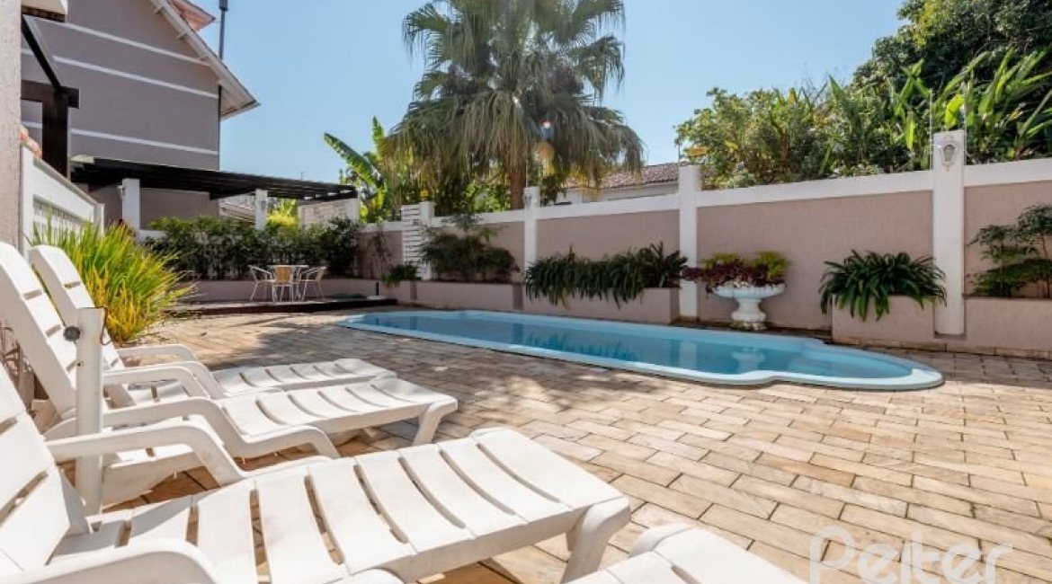 Casa em Condomínio à venda com 162m², 3 dormitórios, 1 suíte, 2 vagas, no bairro Vila Assunção em PORTO ALEGRE