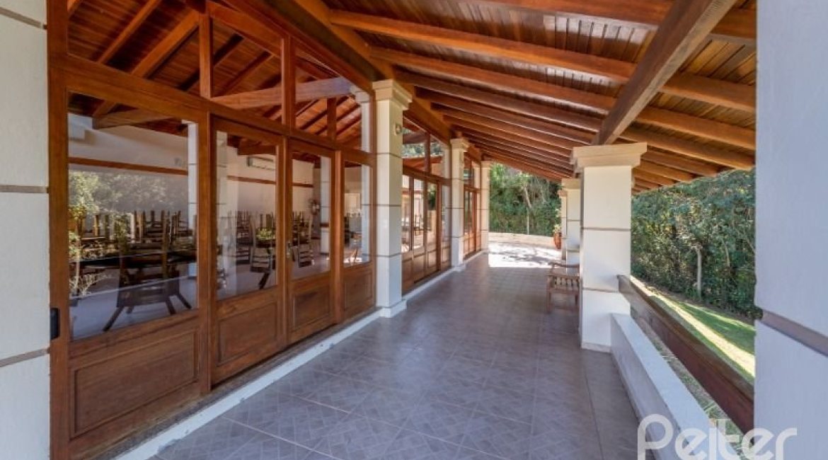 Casa em Condomínio à venda com 242m², 3 dormitórios, 3 suítes, 4 vagas, no bairro Mountain Ville em PORTO ALEGRE