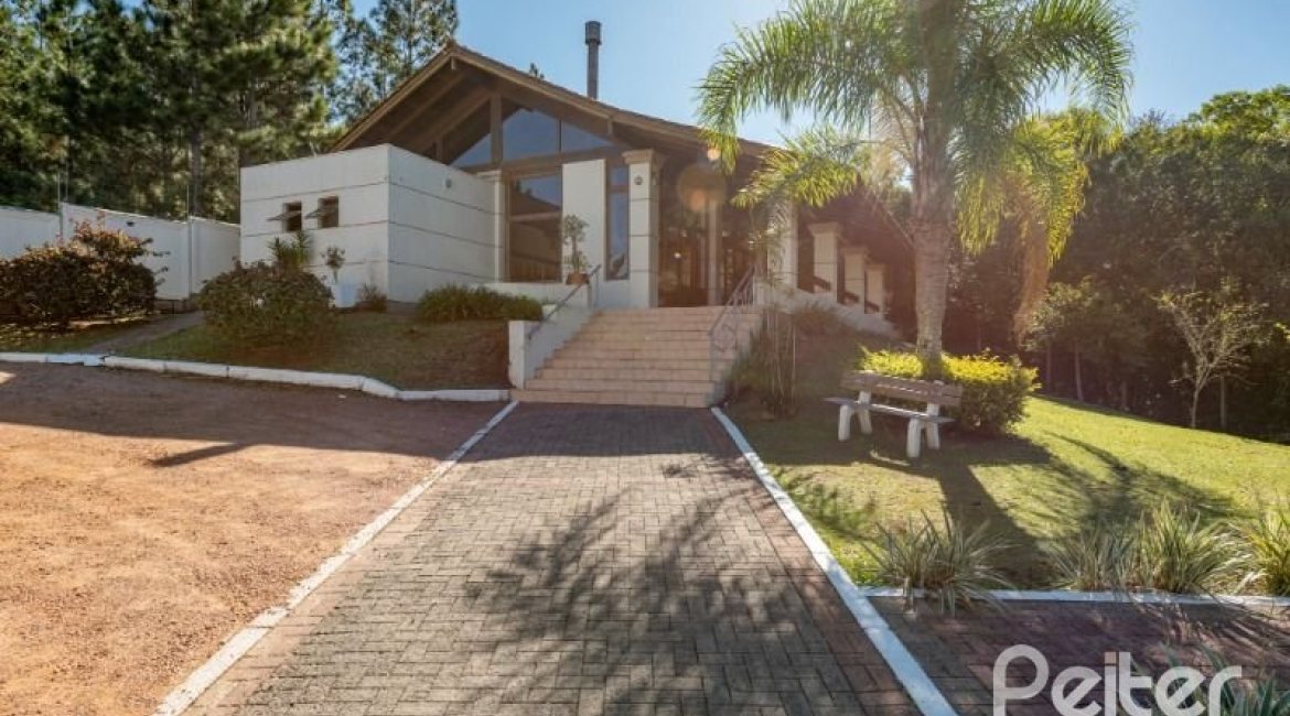 Casa em Condomínio à venda com 242m², 3 dormitórios, 3 suítes, 4 vagas, no bairro Mountain Ville em PORTO ALEGRE