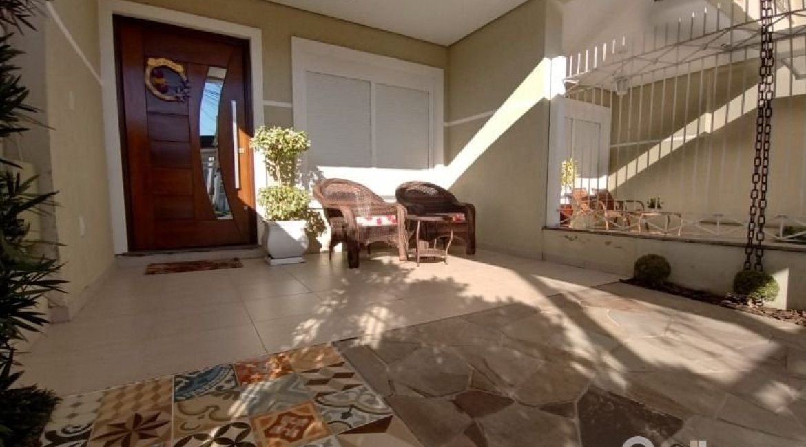 Casa à venda com 118m², 3 dormitórios, 1 suíte, 2 vagas, no bairro Hípica em Porto Alegre