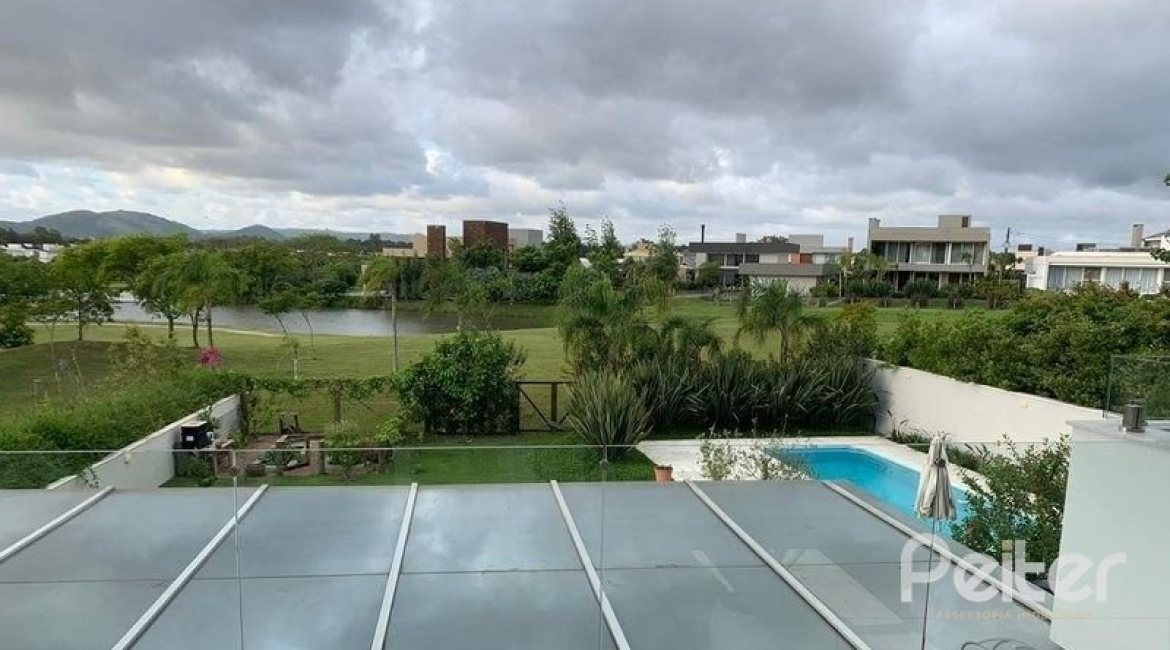Casa em Condomínio à venda com 480m², 4 dormitórios, 4 suítes, 4 vagas, no bairro Terra Ville em PORTO ALEGRE