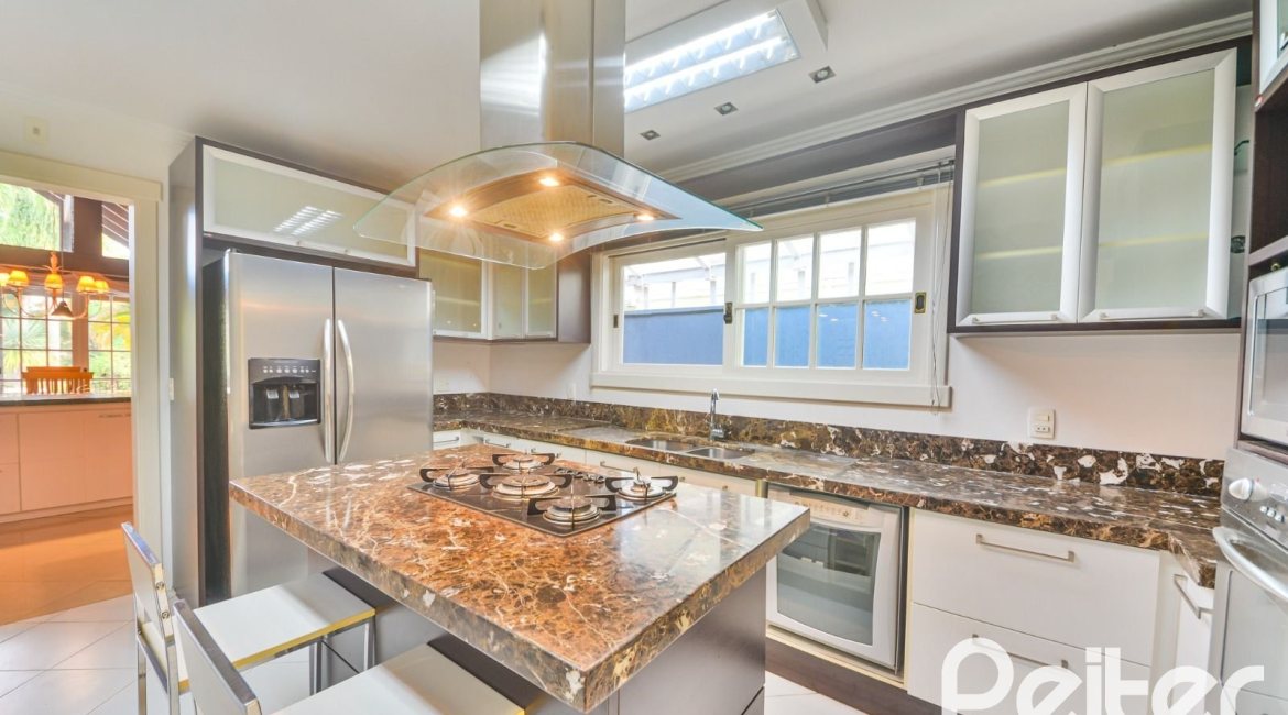 Casa em Condomínio à venda com 358m², 3 dormitórios, 3 suítes, 4 vagas, no bairro Terra Ville em PORTO ALEGRE
