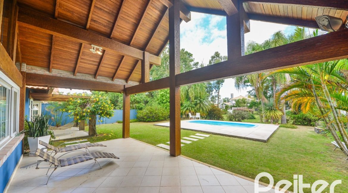 Casa em Condomínio à venda com 358m², 3 dormitórios, 3 suítes, 4 vagas, no bairro Terra Ville em PORTO ALEGRE