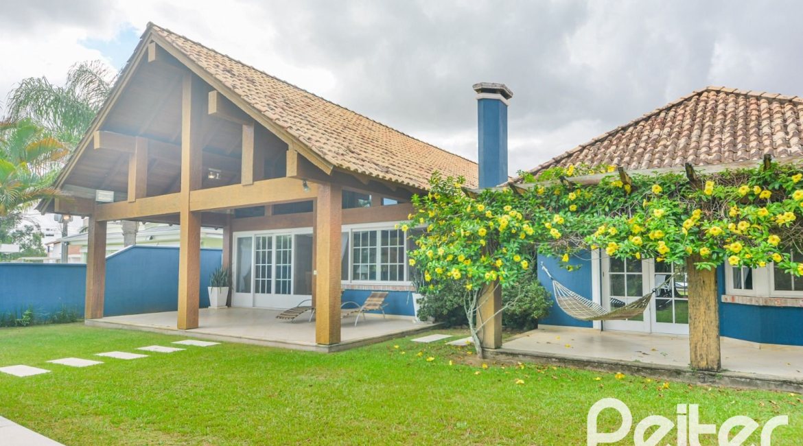 Casa em Condomínio à venda com 358m², 3 dormitórios, 3 suítes, 4 vagas, no bairro Terra Ville em PORTO ALEGRE
