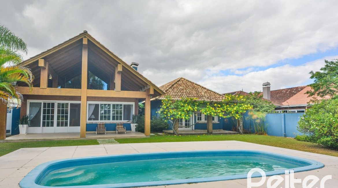 Casa em Condomínio à venda com 358m², 3 dormitórios, 3 suítes, 4 vagas, no bairro Terra Ville em PORTO ALEGRE