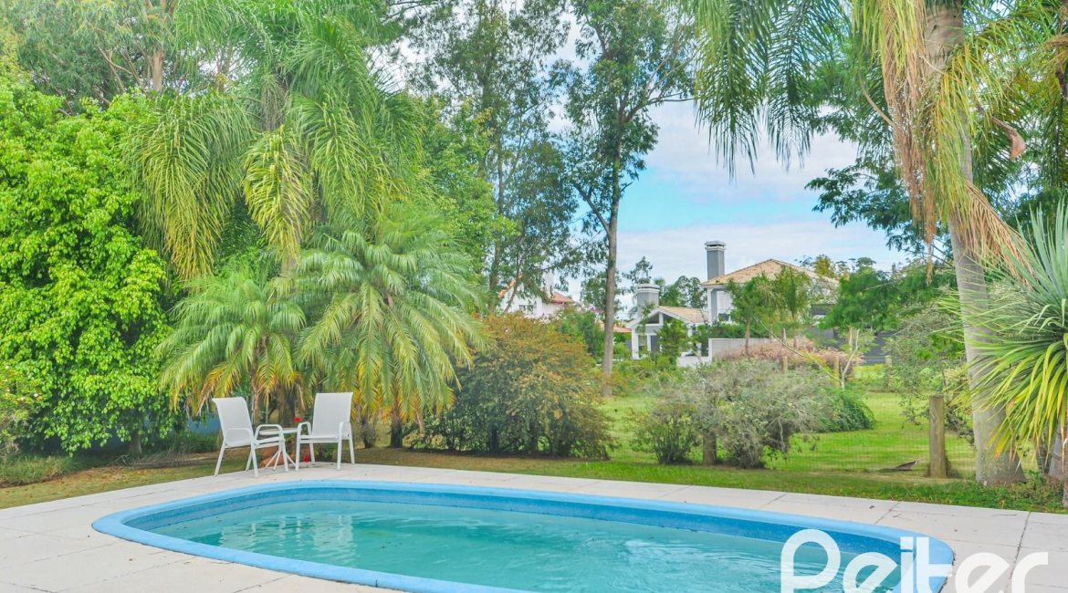 Casa em Condomínio à venda com 358m², 3 dormitórios, 3 suítes, 4 vagas, no bairro Terra Ville em PORTO ALEGRE