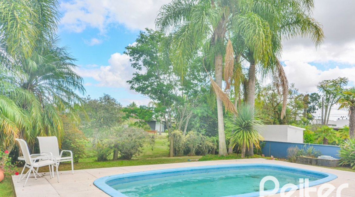 Casa em Condomínio à venda com 358m², 3 dormitórios, 3 suítes, 4 vagas, no bairro Terra Ville em PORTO ALEGRE