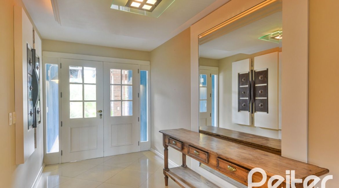 Casa em Condomínio à venda com 358m², 3 dormitórios, 3 suítes, 4 vagas, no bairro Terra Ville em PORTO ALEGRE