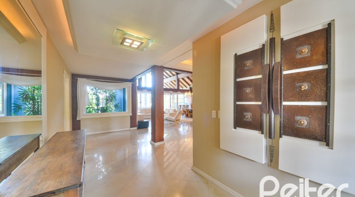 Casa em Condomínio à venda com 358m², 3 dormitórios, 3 suítes, 4 vagas, no bairro Terra Ville em PORTO ALEGRE